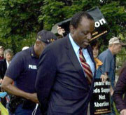 Alan Keyes off to the slammer.